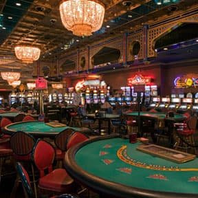 casino play app running on a mobile phone showing slots and sports betting for Filipino players